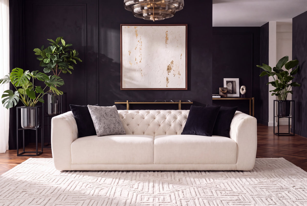 Cloud sofa in off-white fabric in a dark-panelled living room